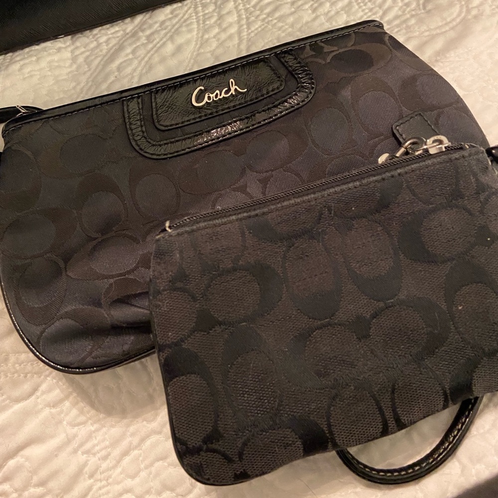 2 black coach clutches